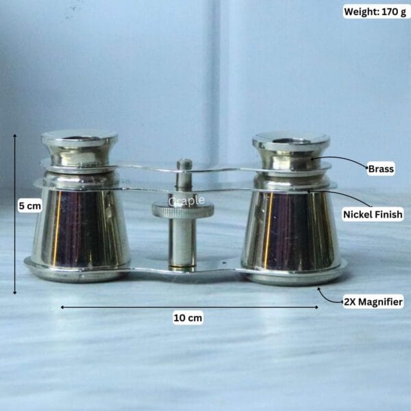 Product image showing the dimensions of the nickel binoculars: 10 cm width, 5 cm height, 170g weight, and 2X magnifier.