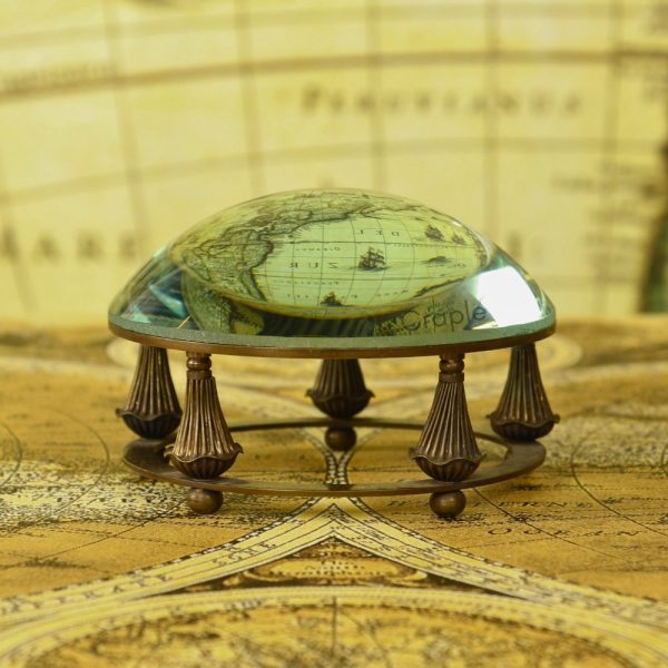 Magnifying and paper weight