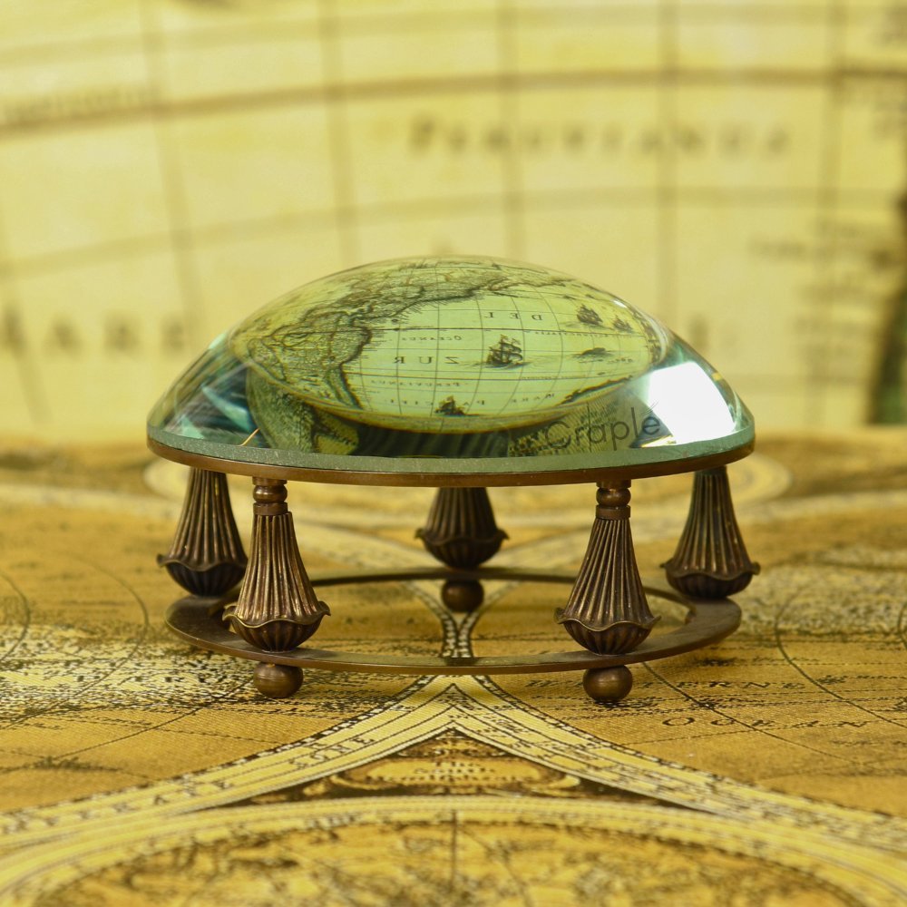 Magnifying and paper weight