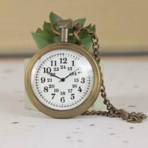 Vintage-style 24-hour dial pocket watch with an antique brass finish and a matching chain.