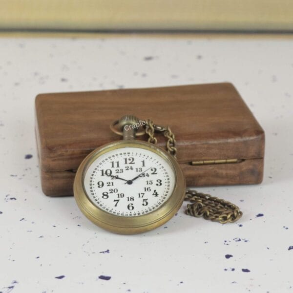 The 24-hour dial pocket watch displayed in front of its closed wooden storage box.