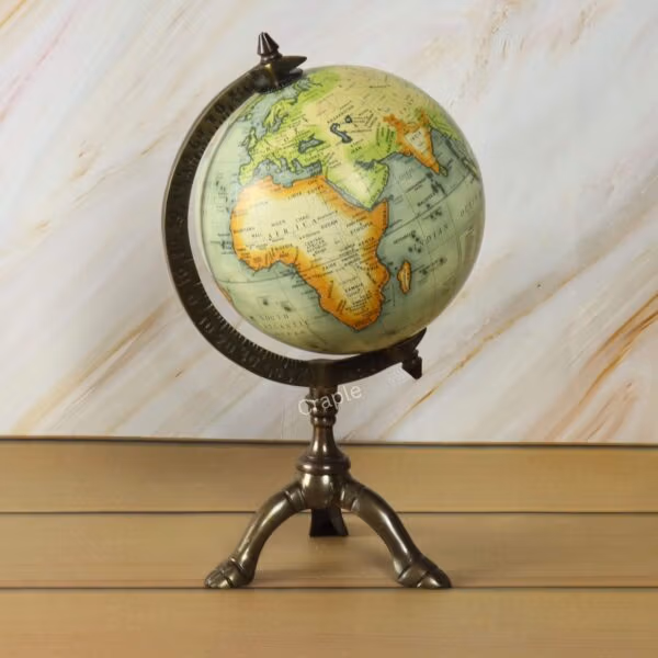 Antique Brass Tripod World Globe-3 The antique brass globe rotated to display the continents of Africa and Europe in detail.