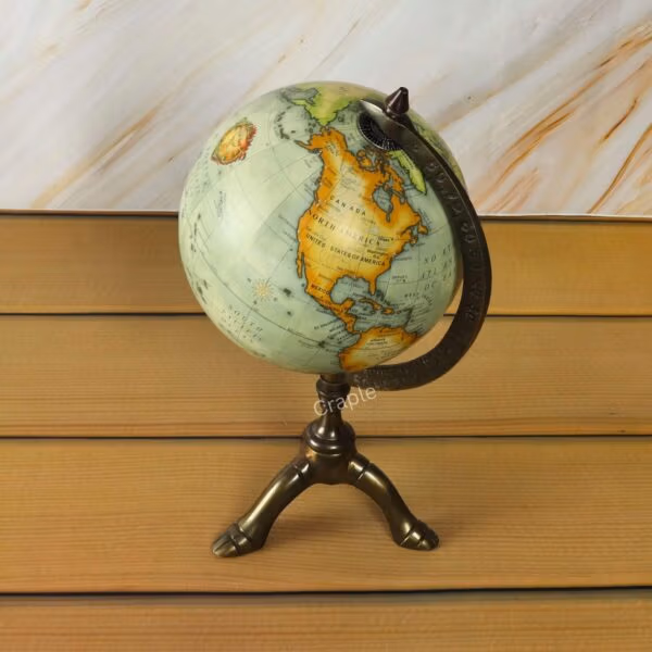 Antique Brass Tripod World Globe-6 Explore the vast continents of Asia and Australia on this exquisitely crafted vintage-style globe.