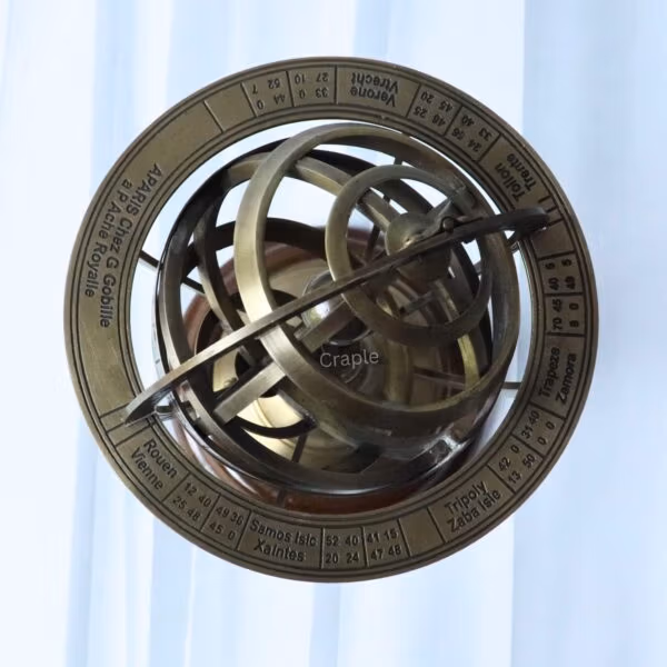 Top-down view of the brass armillary sphere highlighting the outermost zodiac ring and interlocking globes.