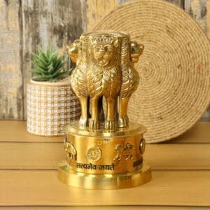 Brass Ashoka Stambh statue, the National Emblem of India, displayed on an office desk.
