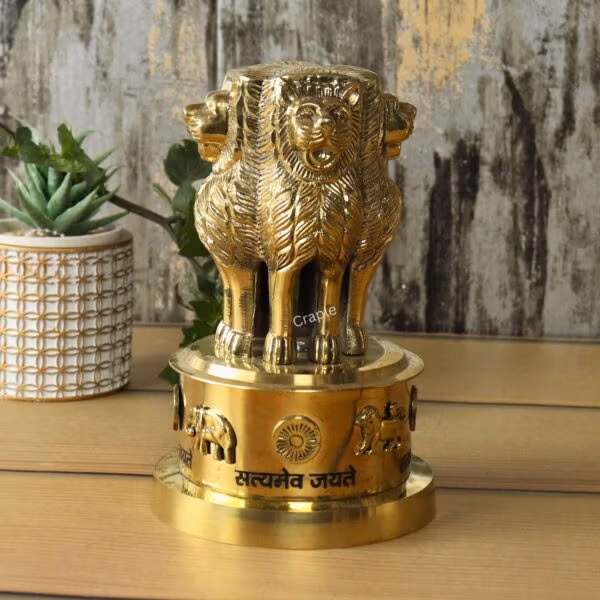 Rear view of the Ashoka Stambh statue's base, showing the detailed carvings of the elephant and the Dharma Chakra.