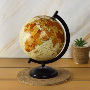 Decorative vintage-style world globe with a black brass base, displaying the continents of Asia and Australia.