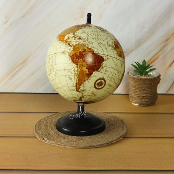 Brass Base Decorative World Globe-2 Vintage desktop globe with a black stand, rotated to show the continents of North and South America.
