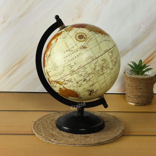 Brass Base Decorative World Globe-3 Rear view of the antique-style rotating world globe, displaying the Pacific Ocean and parts of Asia.