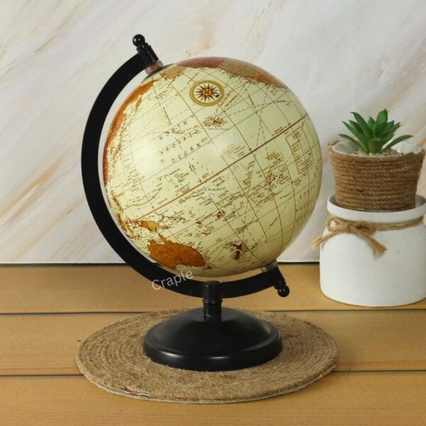 Brass Base Decorative World Globe-4 Tabletop decorative globe with a brass base, angled to feature the continents of Europe and Africa.