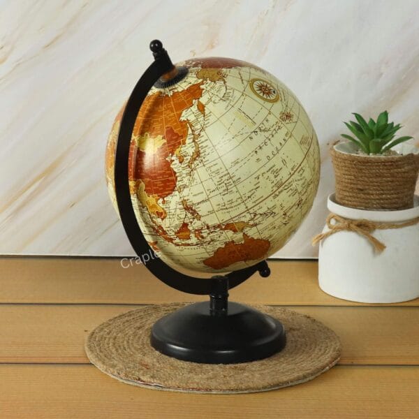 Brass Base Decorative World Globe-5 Close-up of the vintage world globe, focusing on the continent of Africa on its antique-style map.