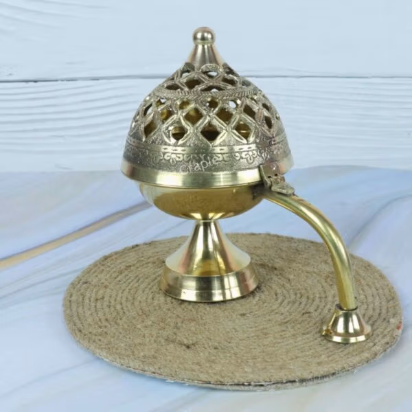 Brass Loban Dani Incense Burner-3 Side profile of the traditional brass incense censer, highlighting the elegant handle and pedestal base.