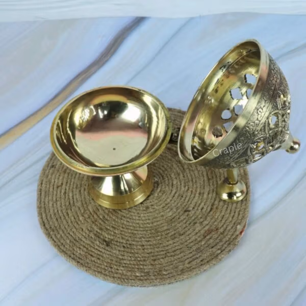 Brass Loban Dani Incense Burner-4 The brass charcoal incense burner shown in two pieces, with the decorative lid resting next to the pedestal base.