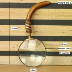 Image of the antique brass magnifier with labeled dimensions: 25 cm length, 10 cm lens width, and 5X magnification.