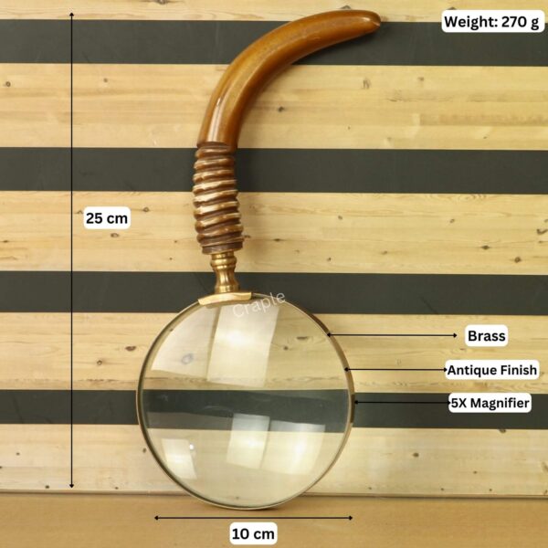 Image of the antique brass magnifier with labeled dimensions: 25 cm length, 10 cm lens width, and 5X magnification.