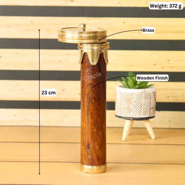 Image of the kaleidoscope with its specifications, showing a height of 23 cm, a weight of 372g, and labeling the brass and wooden finish.