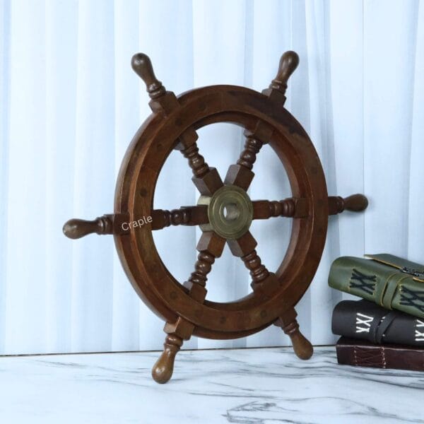 An upright, front-facing view of the 6-spoke wooden ship wheel, highlighting its symmetrical design and craftsmanship.