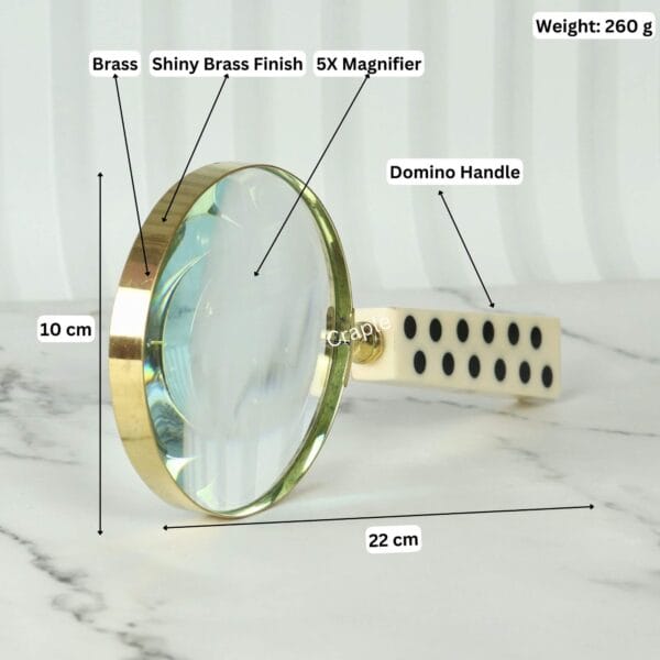 Image of the brass magnifier with labeled dimensions: 22 cm length, 10 cm lens diameter, 260g weight, and 5X magnification.
