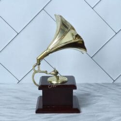 Side profile of the antique-style gramophone highlighting the curved brass arm holding the horn.