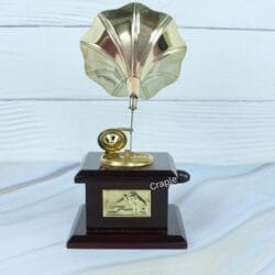 Rear view of the polished brass gramophone horn showing its detailed, scalloped petal construction.
