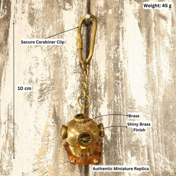 Image of the brass diver helmet keychain with labels showing 10 cm length, 45g weight, and brass material.