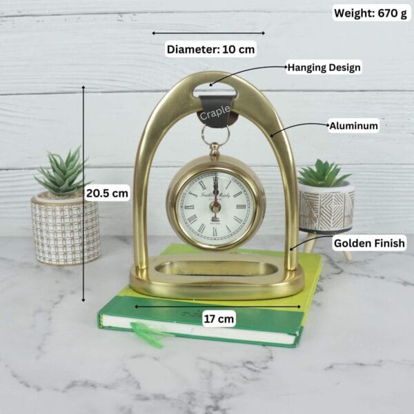 Image showing the dimensions of the golden desk clock: 20.5 cm height, 17 cm width, 10 cm diameter, and 670 g weight.