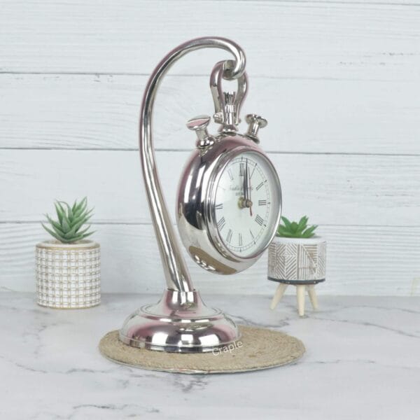Side profile of the hanging desk clock, showing the curved aluminum stand and the depth of the stopwatch casing.