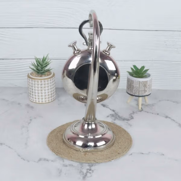 Rear view of the aluminum stopwatch desk clock, showing the back of the casing and the stand's construction.