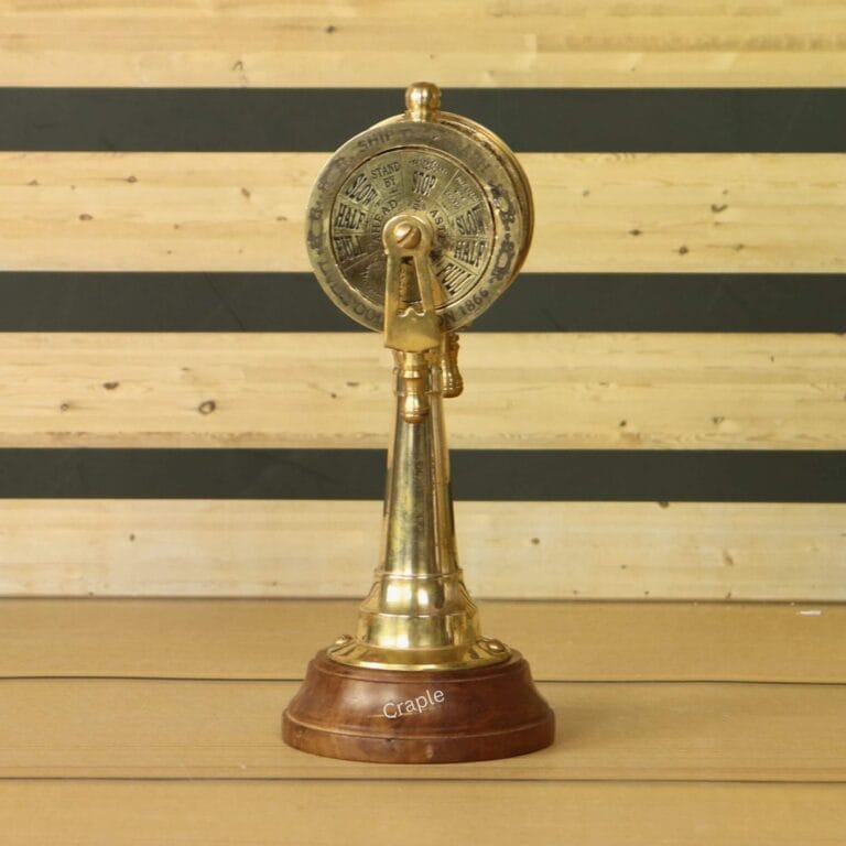 Main product image of a vintage-style brass ship's engine order telegraph with a wooden base, shown from the front.