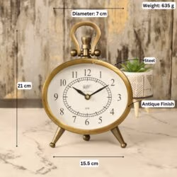 Image of the antique oval clock with labeled dimensions: 21 cm height, 15.5 cm width, and 635g weight.