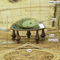 Image of the brass dome magnifier and stand with labeled dimensions: 9.5 cm height, 7 cm width, and 550g weight.
