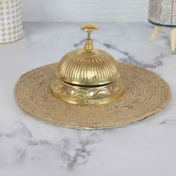 Service Desk Call Brass Bell-1 Vintage-style brass service desk bell with a fluted top and ornate engraved base, for a hotel or reception