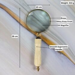 Infographic showing the brass magnifier's dimensions: 26 cm length, 10 cm lens, 310g weight, and 5X magnification.
