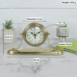 Product image of the golden desk clock with labeled dimensions: 25 cm width, 13.5 cm height, and 550g weight.