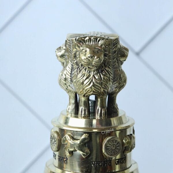 Front-facing close-up of the four-lion emblem on the top of the brass Ashoka Pillar statue.