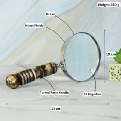 Image showing the magnifying glass specifications: 22 cm long, 10 cm lens, 280g weight, 5X magnifier, with a nickel finish and turned resin handle.