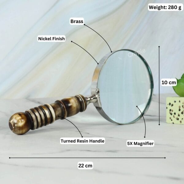 Image showing the magnifying glass specifications: 22 cm long, 10 cm lens, 280g weight, 5X magnifier, with a nickel finish and turned resin handle.