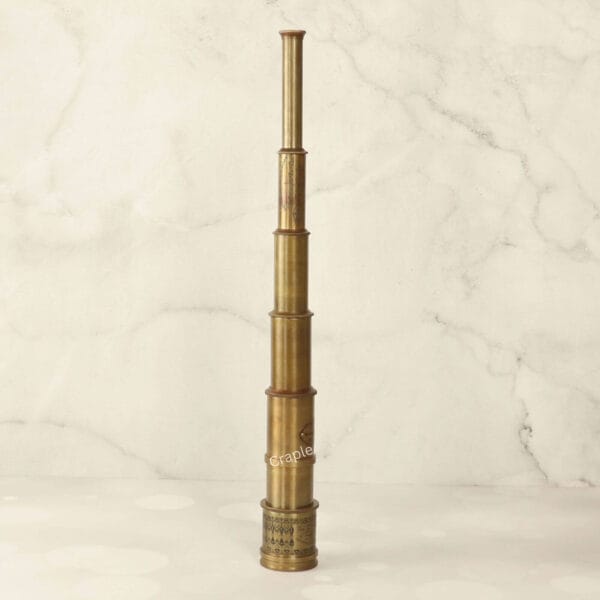 Fully extended 20-inch Victorian marine spyglass with a collapsible, multi-draw antique brass body.