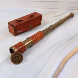 Vintage Dollond London 1920 replica brass telescope, fully extended, displayed with its protective leather case.