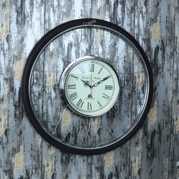 Bicycle Rim & Tire Steel Wall Clock-1 Unique wall clock made from a bicycle wheel, featuring a vintage-style clock face with Roman numerals inside the steel spokes.