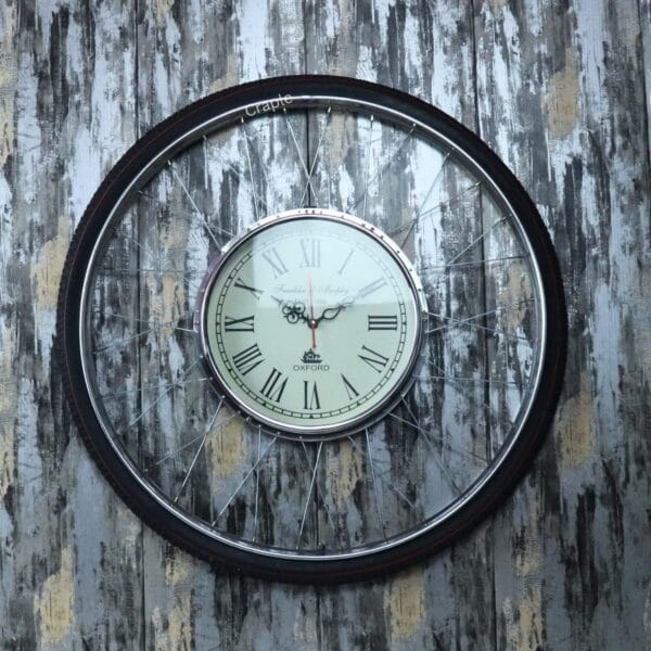 Bicycle Rim & Tire Steel Wall Clock-2 Industrial-style wall clock crafted from a bicycle rim and tire, with a vintage Roman numeral clock at the center.