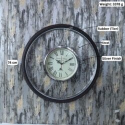 Image of the bicycle wheel clock with dimensions labeled: 74 cm diameter and 3378g weight.