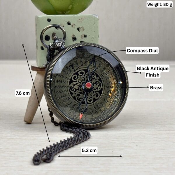 Black antique brass compass with dimensions labeled: 7.6 cm height, 5.2 cm width, and 80g weight.