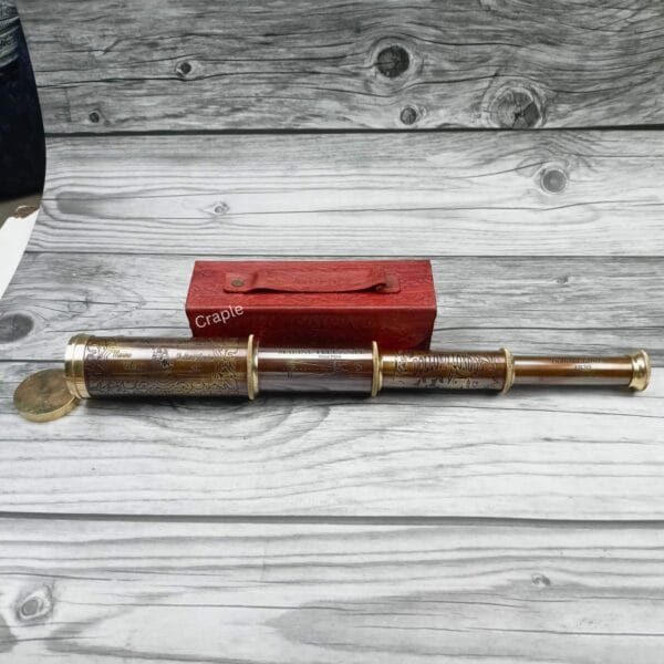 The Dollond London marine telescope fully extended, showing all four brass collapsible sections.