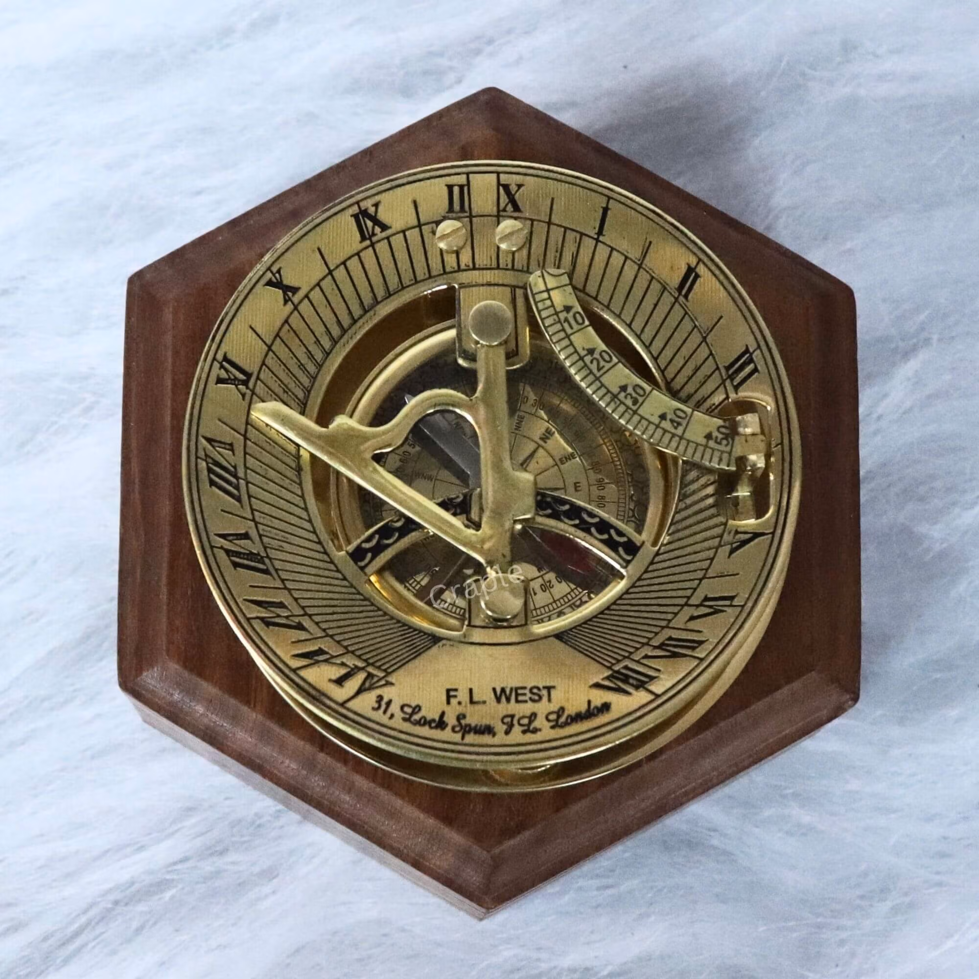 F.L. West London Sundial Compass-6 Polished brass F.L. West London sundial compass presented on a handsome hexagonal wooden display base.