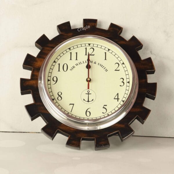 Industrial gear-shaped wooden wall clock with a polished aluminum bezel and a nautical-themed cream dial.