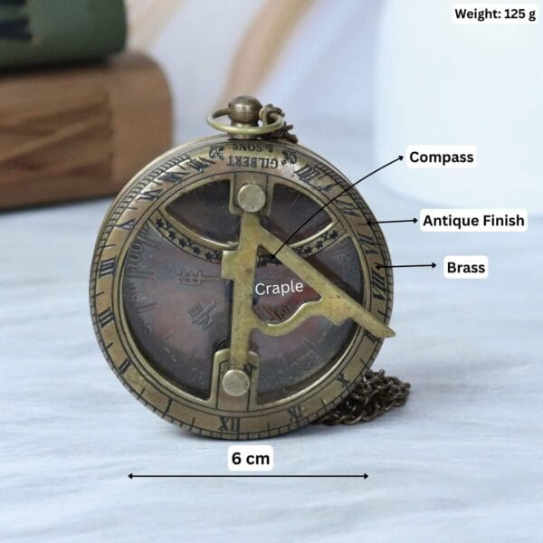 Gilbert & Sons brass sundial compass with its dimensions labeled, showing a 6 cm diameter and 125g weight.
