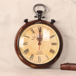 Vintage stopwatch-style wall clock with a brown antique wooden frame and an aged dial with Roman numerals.