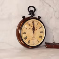 Angled view of the vintage wooden stopwatch clock, showing the depth of its rich brown, antique-finished frame.