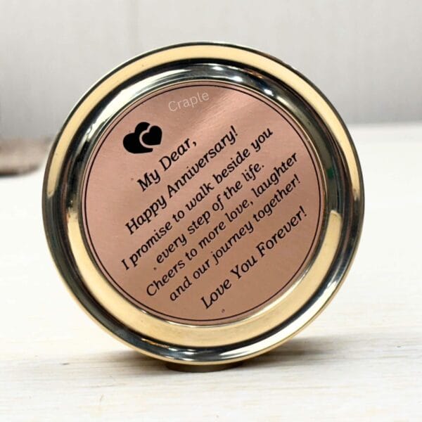 Detailed view of the "My Dear, Happy Anniversary!" romantic engraving inside the compass lid.
